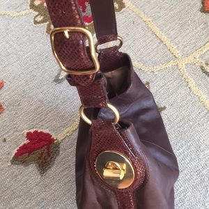 Beautiful brown leather coach purse
